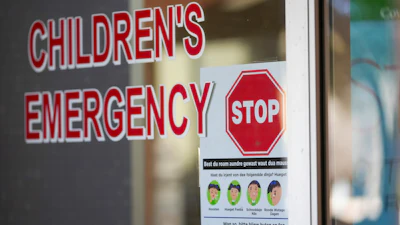 A sign is posted in German at the entrance of the children's emergency room at Covenant Children's Hospital, Tuesday, Feb. 25, 2025, in Lubbock, Texas.