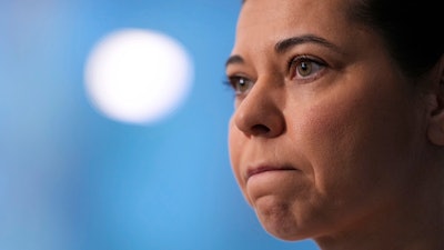 Dani Dumitriu talks to reporters at her office in New York, Thursday, March 20, 2025.