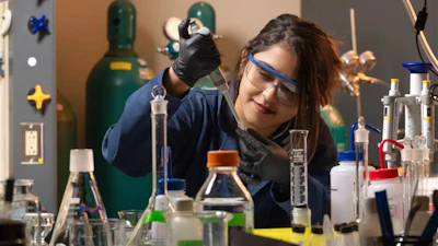 Ruma Paul, a doctoral student in chemistry at The University of Texas at El Paso, works in the lab on a device that can more easily and safely detect colorectal cancer. The device is described in a new study published in the journal ACS Measurement Science Au.