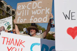 Demonstrators hold a rally in support of the Centers for Disease Control and Prevention in front of the agency's headquarters in Atlanta, Tuesday, April 1, 2025, after layoffs were announced.