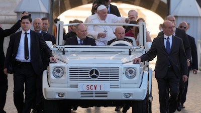 Pope Francis arrives on the popemobile to meet with members of the Comunione e Liberazione (Communion and Liberation) Catholic lay movement in St. Peter's Square at the Vatican, Oct.15, 2022.