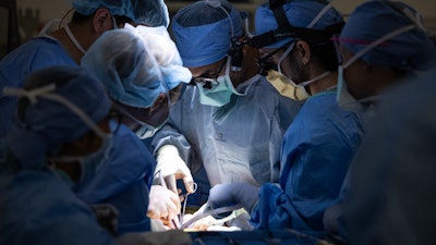 UCLA surgeons perform the bladder transplant.