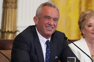 Health and Human Services Secretary Robert F. Kennedy Jr., left, and Education Secretary Linda McMahon attend a Make America Healthy Again (MAHA) Commission Event in the East Room of the White House, Thursday, May 22, 2025, in Washington.