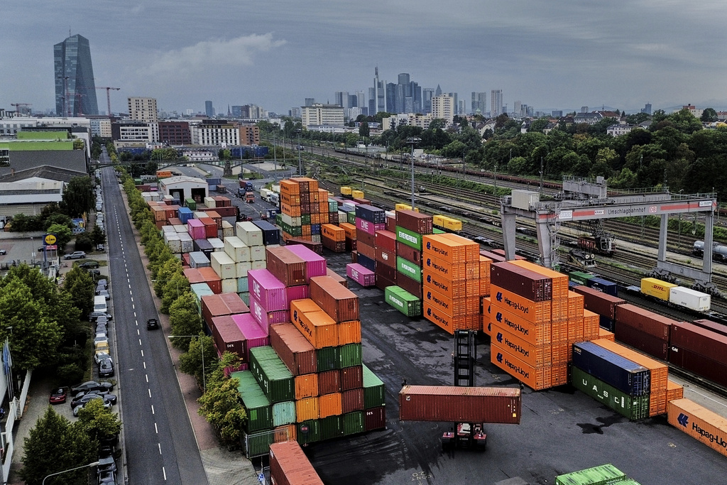 Containers are piled upon a cargo terminal in Frankfurt, Germany, Tuesday, Sept. 9, 2025.