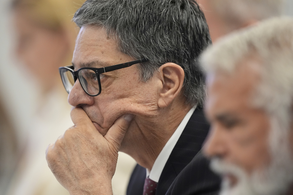Committee member Dr. James Pagano listens during a meeting of the Advisory Committee on Immunization Practices at the CDC on Thursday, Sept. 18, 2025, in Chamblee, Ga.