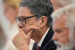 Committee member Dr. James Pagano listens during a meeting of the Advisory Committee on Immunization Practices at the CDC on Thursday, Sept. 18, 2025, in Chamblee, Ga.