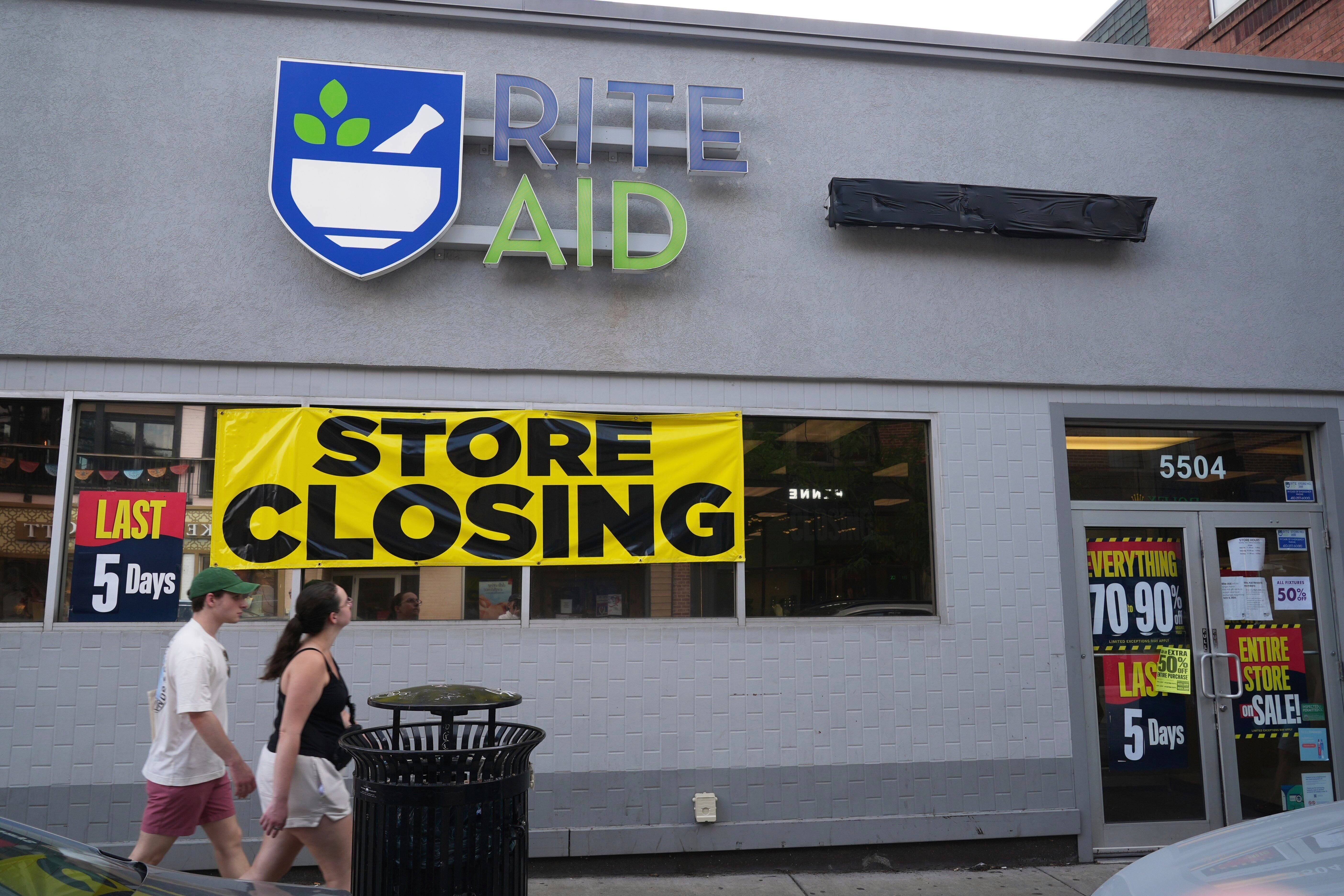 A store closing banner hangs on a Rite Aid store in Pittsburgh on June 25, 2025.