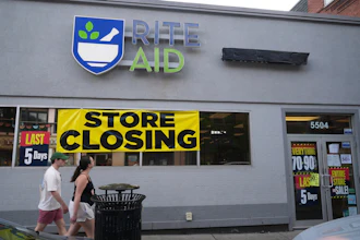Rite Aid pharmacy storefront with 'Store Closing' banner, showing last 5 days of business
