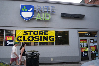 A store closing banner hangs on a Rite Aid store in Pittsburgh on June 25, 2025.