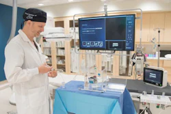 Dr. Derek Cool, Associate Scientist at London Health Sciences Centre Research Institute (LHSCRI) and Interventional Radiologist at London Health Sciences Centre (LHSC), demonstrating the equipment used to deliver radioactive beads to treat patients with kidney cancer.