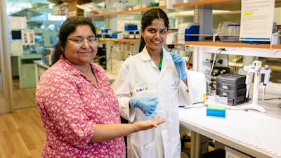 Dr. Shalini Prasad (left) and biomedical engineering doctoral student Nikini Subawickrama show off the electrochemical sensor technology that could lead to a new tool for detecting various thoracic cancers.