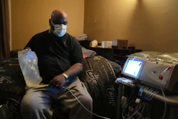 Ahmad Collins, a city government worker and former Penn State linebacker, prepares for his nightly dialysis at his home in Harrisburg, Pa., Thursday, Dec. 11, 2025.