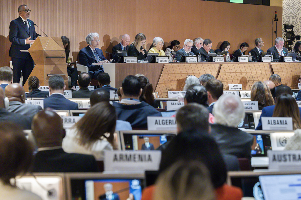 Director General of the World Health Organization (WHO) Tedros Adhanom Ghebreyesus, left, delivers his statement, during the opening of the 78th World Health Assembly at the European headquarters of the United Nations in Geneva, Switzerland, May 19, 2025.
