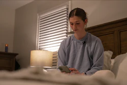 Middle school teacher Kate Stoye checks her sleep score on her phone, Wednesday, Jan. 7, 2026, in Hiram, Ga