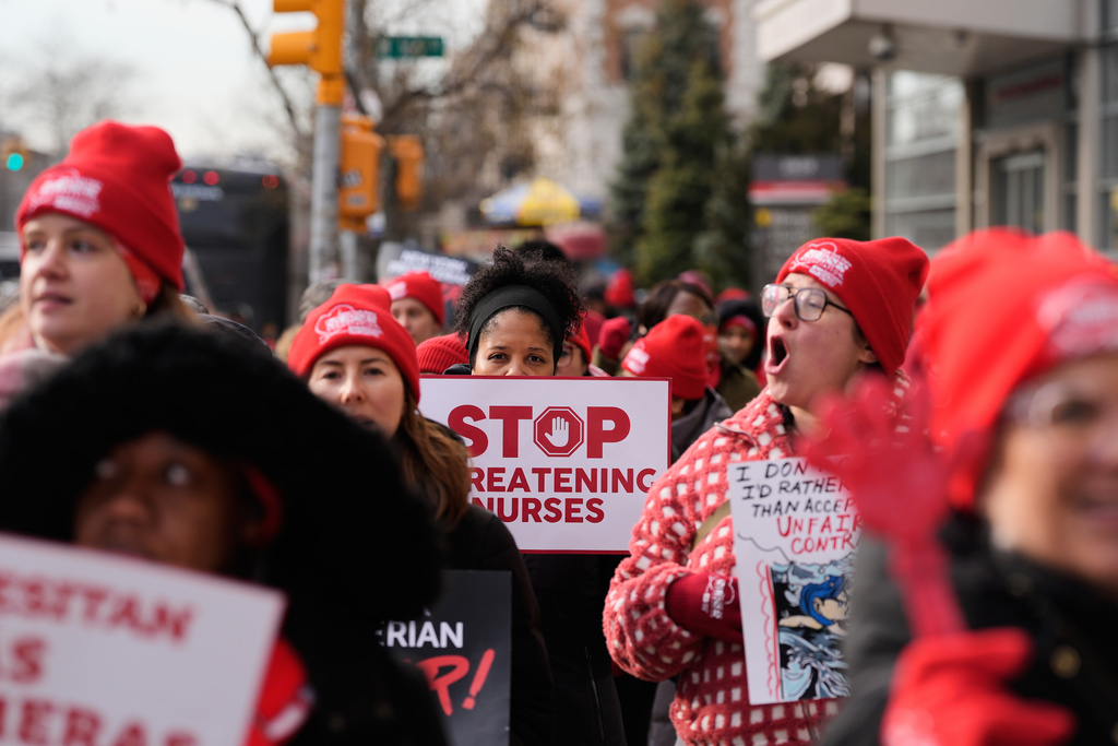Striking nurses and supporters demonstrate outside NewYork-Presbyterian Hospital in New York, Thursday, Jan. 22, 2026.