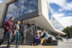Students Outside Building On Campus (1)