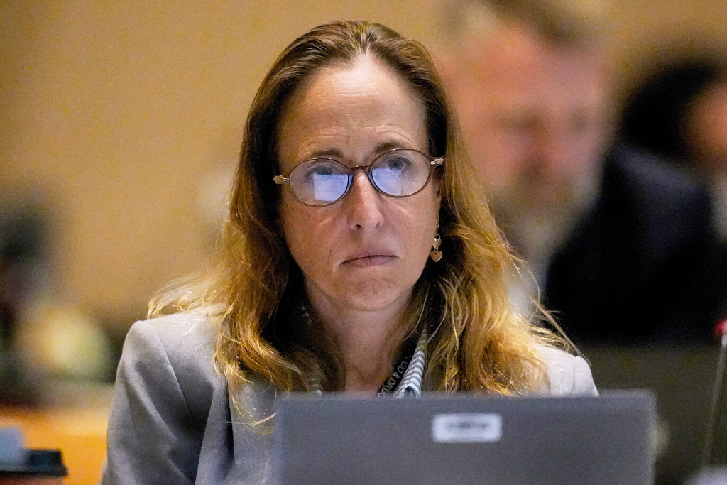 Dr. Tracy Beth Hoeg, with the FDA, listens during a meeting of the Advisory Committee in Immunization Practices at the CDC, June 25, 2025, in Atlanta.