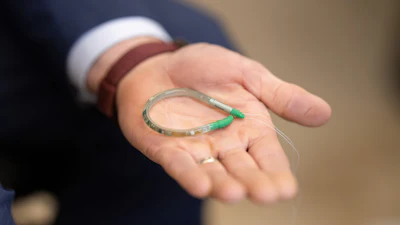 Bright Uro Glean Sensor In Hand