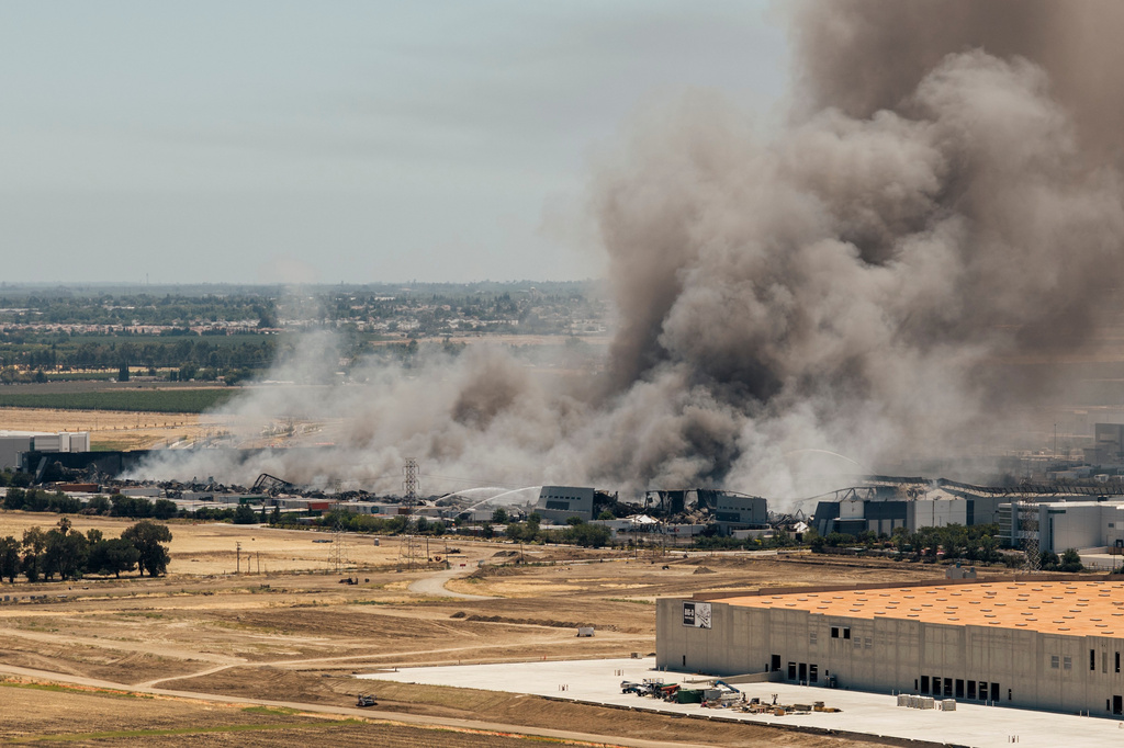 Smoke is seen from the massive fire at the Medline medical supply warehouse in Tracy, Calif., Friday, June 12, 2026.