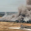Smoke is seen from the massive fire at the Medline medical supply warehouse in Tracy, Calif., Friday, June 12, 2026.