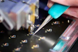 An electromagnetic sensor integrated into a flex board assembly.