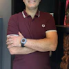 Benjamin Sanchez Teronnes wearing a prototype of the wearable device he developed for monitoring blood pressure.