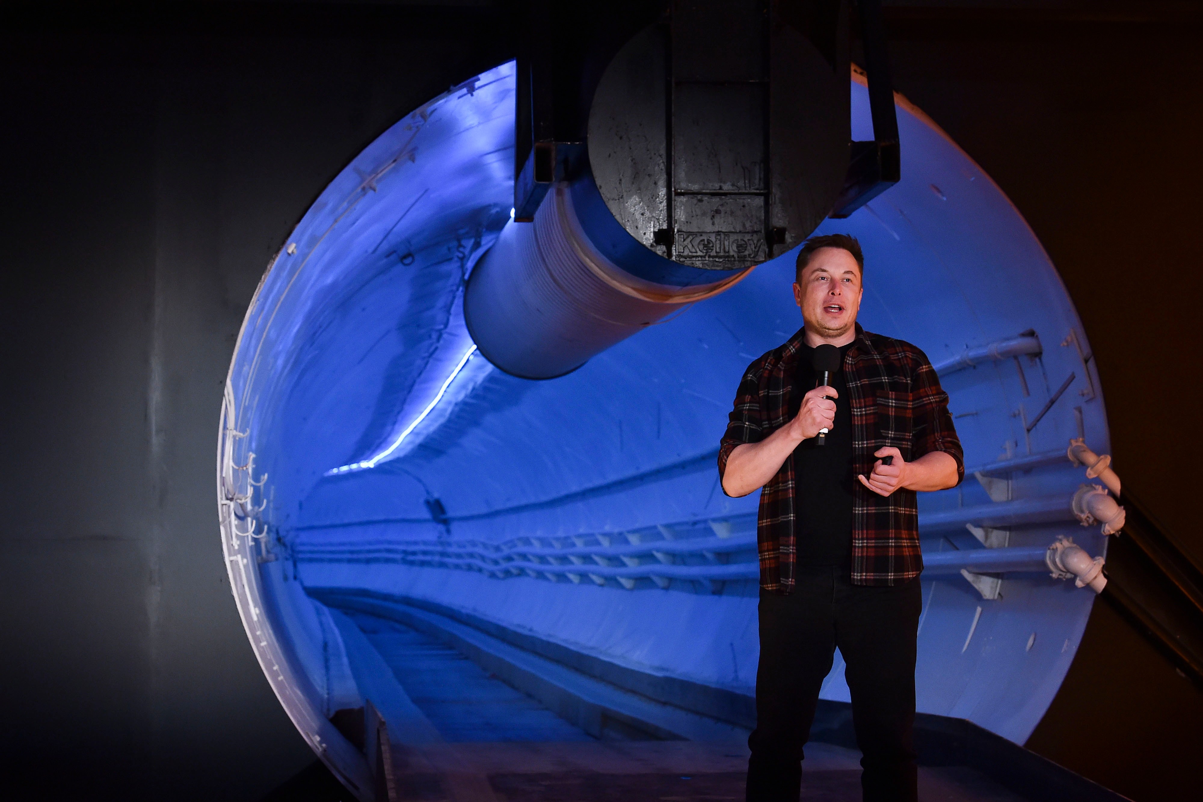 Elon Musk, co-founder and chief executive officer of Tesla Inc., speaks during an unveiling event for the Boring Co. Hawthorne test tunnel in Hawthorne, Calif., on Tuesday, Dec. 18, 2018.