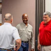 Retired Major General Mike Talley (center) met last month in Chillicothe with U.S. Paper Mill executives, including Michelle Tolliver (left) and Bob Stanley (right).