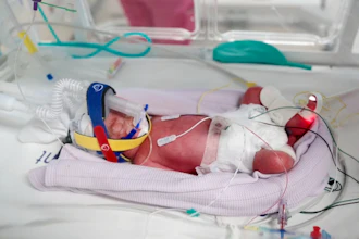 In this image taken from video taken on July 15, 2026, one of the quadruplets born at Metro North Health hospital lies in an incubator in Brisbane, Australia.