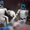 A second successful surgery was performed by two humanoid robots working side by side in a robot-robot team.