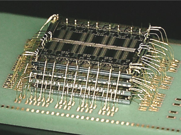 A stacked die assembly with waterfall wirebonds produced at Promex. Packing multiple die vertically within a tight mechanical envelope requires every material and process variable — spacer thickness, die attach film bondline, wire bond arc height — to be engineered as a system, not selected independently.