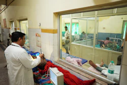 Dr. Abhishek Pranayami examines a patient suffering from a heat-related illness amid high temperatures at a district government hospital in Banda, northern Indian state of Uttar Pradesh, June 19, 2026.