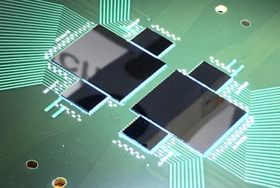 Multi-die flip-chip assembly on substrate. At micron-scale tolerances, manufacturing process control is inseparable from sensor performance.