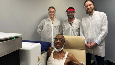The first patient enrolled in the CANSCAN trial undergoes scanning with the VxWave Ultrasound Imaging System, a robotic tomographic ultrasound platform designed for on-demand upper-limb vascular imaging within the dialysis clinic.