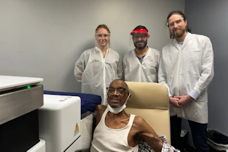 The first patient enrolled in the CANSCAN trial undergoes scanning with the VxWave Ultrasound Imaging System, a robotic tomographic ultrasound platform designed for on-demand upper-limb vascular imaging within the dialysis clinic.