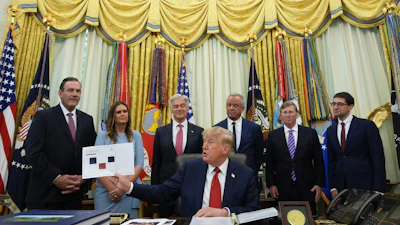 President Donald Trump speaks as South Dakota Gov. Larry Rhoden, from left, Arkansas Gov. Sarah Huckabee Sanders, Mehmet Oz, administrator of the Centers for Medicare & Medicaid Services, Health and Human Services Secretary Robert F. Kennedy Jr., Mississippi Gov. Tate Reeves and Abe Sutton, director of the Center for Medicare and Medicaid Innovation, listen during an event about healthcare in the Oval Office of the White House, Friday Sept. 18, 2026, in Washington.