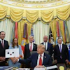 President Donald Trump speaks as South Dakota Gov. Larry Rhoden, from left, Arkansas Gov. Sarah Huckabee Sanders, Mehmet Oz, administrator of the Centers for Medicare & Medicaid Services, Health and Human Services Secretary Robert F. Kennedy Jr., Mississippi Gov. Tate Reeves and Abe Sutton, director of the Center for Medicare and Medicaid Innovation, listen during an event about healthcare in the Oval Office of the White House, Friday Sept. 18, 2026, in Washington.