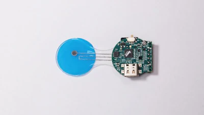 The HELP patch integrates porous flexible input/output connectors and a miniature wireless printed circuit board.