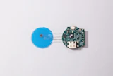 The HELP patch integrates porous flexible input/output connectors and a miniature wireless printed circuit board.