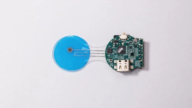 The HELP patch integrates porous flexible input/output connectors and a miniature wireless printed circuit board.