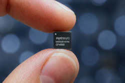 MintNeuro microchip held between fingertips displaying model number MN200816-RA