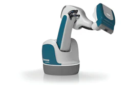 Stäubli collaborative robotic arm with teal and white design featuring articulated joints and gripper end-effector