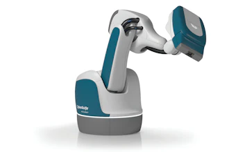 Stäubli collaborative robotic arm with teal and white design featuring articulated joints and gripper end-effector