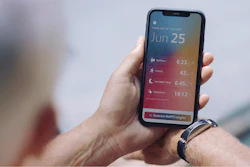 Person holding smartphone displaying daily health metrics including steps, activity, sleep tracking, and meditation data with date June 25