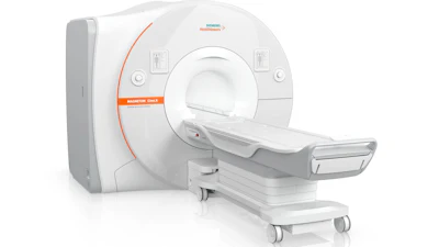 Siemens MAGNETOM medical imaging scanner with white casing and orange accent stripe