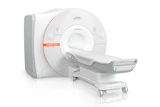 Siemens MAGNETOM medical imaging scanner with white casing and orange accent stripe